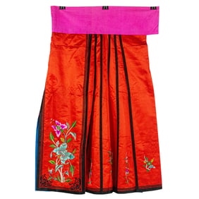 A Chinese embroidered red-ground lady's apron