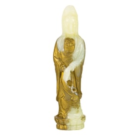 A Chinese white jade figure of Guanyin