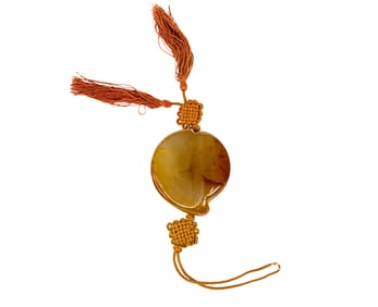 A Chinese agate peach-form toggle pendant