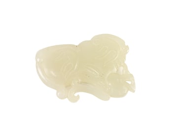 A Chinese celadon jade carving of beast