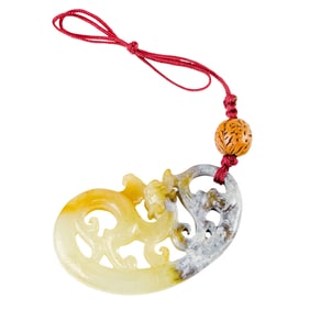 A Chinese celadon jade 'chilong' pendant