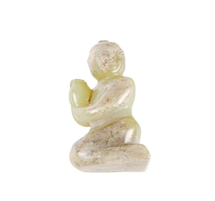 A Chinese celadon jade carving of kneeling figure