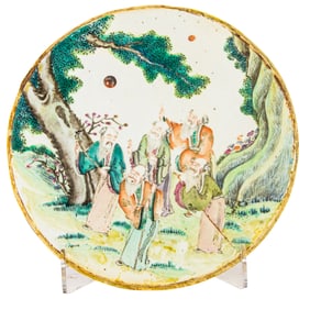 A Chinese famille rose circular porcelain plaque