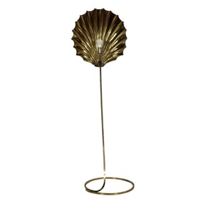 A Modernist hammered brass shell form floor lamp in the style of Hans Moller