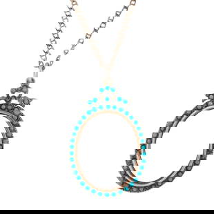 A silver and turquoise necklace: A silver and turquoise necklaceFeaturing a transparent locket, framed by 46 turquoise cabachons measuring approximately 2 x 2 mm; 20.25 grams; pendant length: 2 inches; chain length: 18 inches