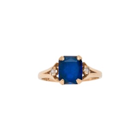 A sapphire, diamond and 14k gold ring