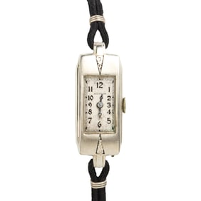 A fourteen karat white gold dress watch