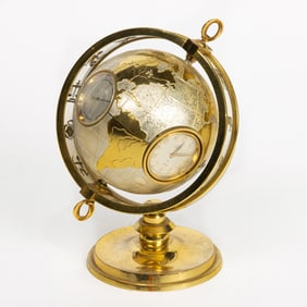 An Angelus globe combination clock and weather station