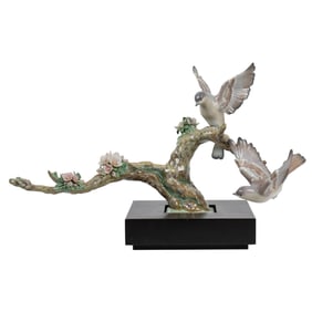 A Lladro Utopia porcelain figure of birds resting on a cherry blossom branch