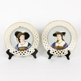 A pair of German, late 19th century porcelain cabinet plates depicting female portraits