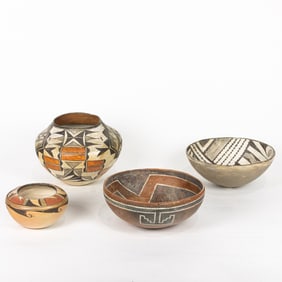 A group of four Native American vessels, including Hopi