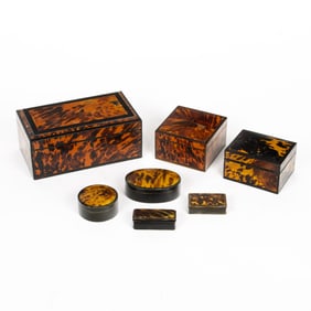 A group of seven shell veneered boxes, greatest 3