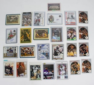Twenty-six football, baseball and basketball cards, comprised mostly of football cards