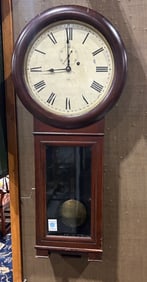 Seth Thomas regulator wall clock, in a cherry case, roman numeral painted metal dial, paper label to
