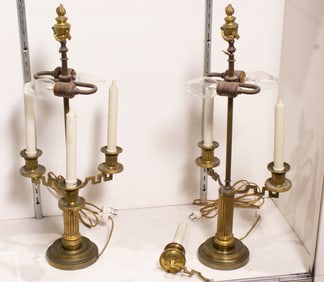 A pair of Neoclassical style gilt bronze three-light candelabra form table lamps