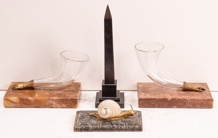 An assembled group of paperweights