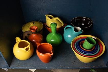 A collection of sixteen pieces Bauer Pottery, California: bowls, pitchers and decanters