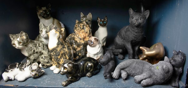 Ten English Winstanley Pottery figures of cats