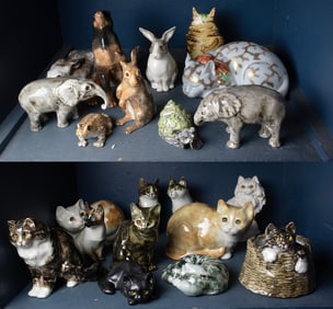 Eight English Winstanley ceramic figures of rabbits