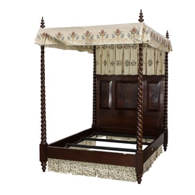 A contemporary four-poster canopy bed, barley twist supports surmounted by finials, paneled