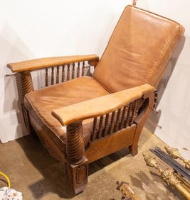A carved oak recliner