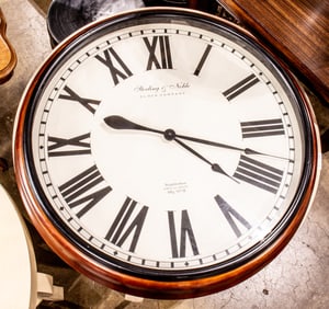 A Sterling and Noble wall clock