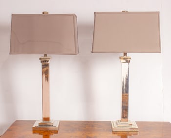 A pair of Contemporary chromed table lamps