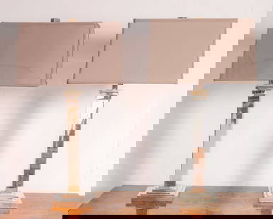 A pair of Contemporary chromed table lamps: A pair of Contemporary chromed table lamps, each of square columnar form, 26.25"h (top of shade)