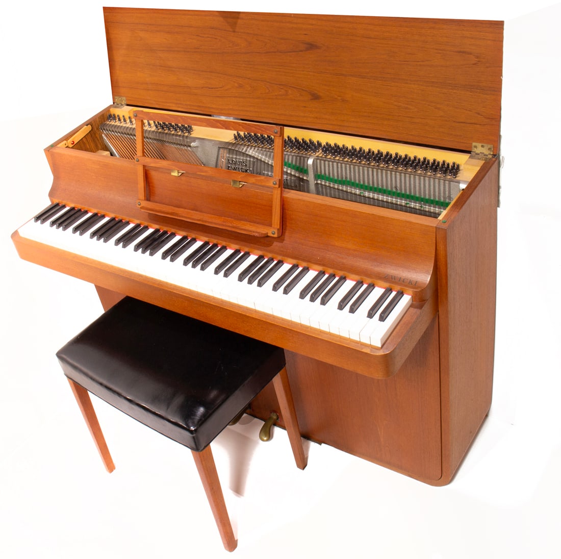 A Danish Louis Zwicki Mid-Century upright teak pianette with stool: A Danish Louis Zwicki Mid-Century upright teak pianette with stool, #11254 to interior, 82 keys. the sheet music holder expanding from the interior. 35.5"h x 49.25"l x 22"d
