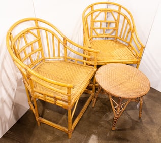 Two rattan/cane lounge chairs with a round cocktail table, the chairs: 35