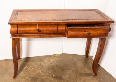 A wood console with two drawers