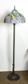 A vintage Tiffany style leaded glass floor lamp