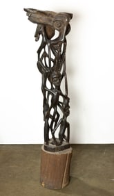 A tall African Makonde tree of life carving