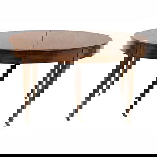 A highly figured mahogany banquet table in the Federal taste: A highly figured mahogany banquet table in the Federal taste, 19th century, the large form with six 20" leaves, both the table and leaves with nearly the same coloration and identical recent finish, a
