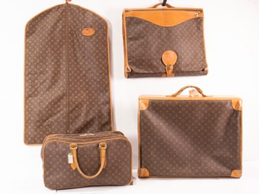 A vintage Louis Vuitton monogram canvas four piece suite of luggage