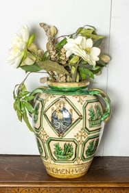 An Italian polychrome shouldered oil jar