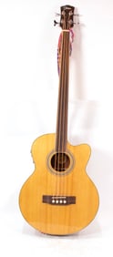 A Johnson JB-24F aucoustic electric bass guitar