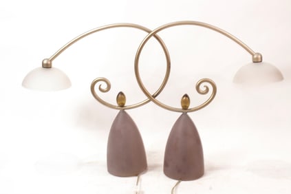 A pair of Modern glass and silvered metal table lamps