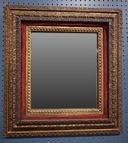 A Victorian gilt repousse picture frame