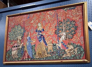 A Medieval style needlepoint tapestry: La Damme a La Licorrne L'Odorat (The Lady and the Unicorn)