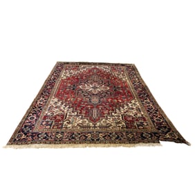 A Persian Heriz carpet