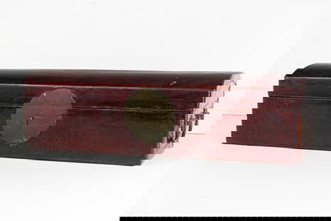 A Chinese lacquered leather scroll box: A Chinese lacquered leather scroll box. Republic period, 22" wide.