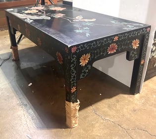 A Chinese black lacquered low table