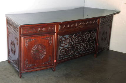 A Chinese hardwood kneehole desk