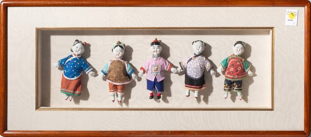 Group of five Chinese porcelain dolls