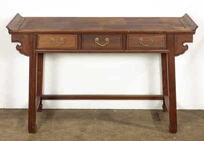 A Chinese hardwood coffer table