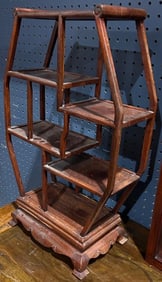 A Chinese hardwood display shelf