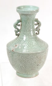 A Chinese celadon glazed lotus vase