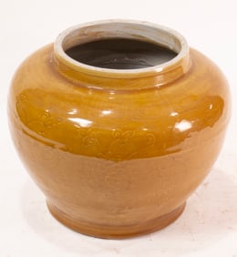 A Chinese yellow-glazed 'lotus' jar