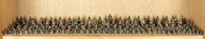 A shelf of Burmese bronze weights